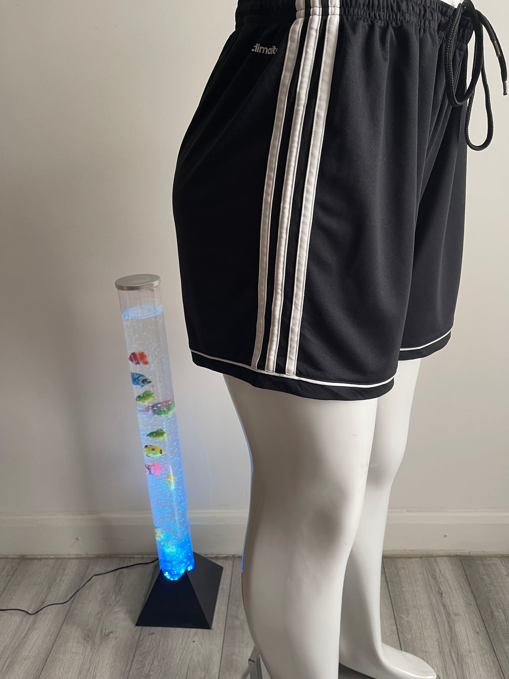 🏃‍♀️ Stylish Adidas women's training shorts in black with white side panel and Adidas logo.