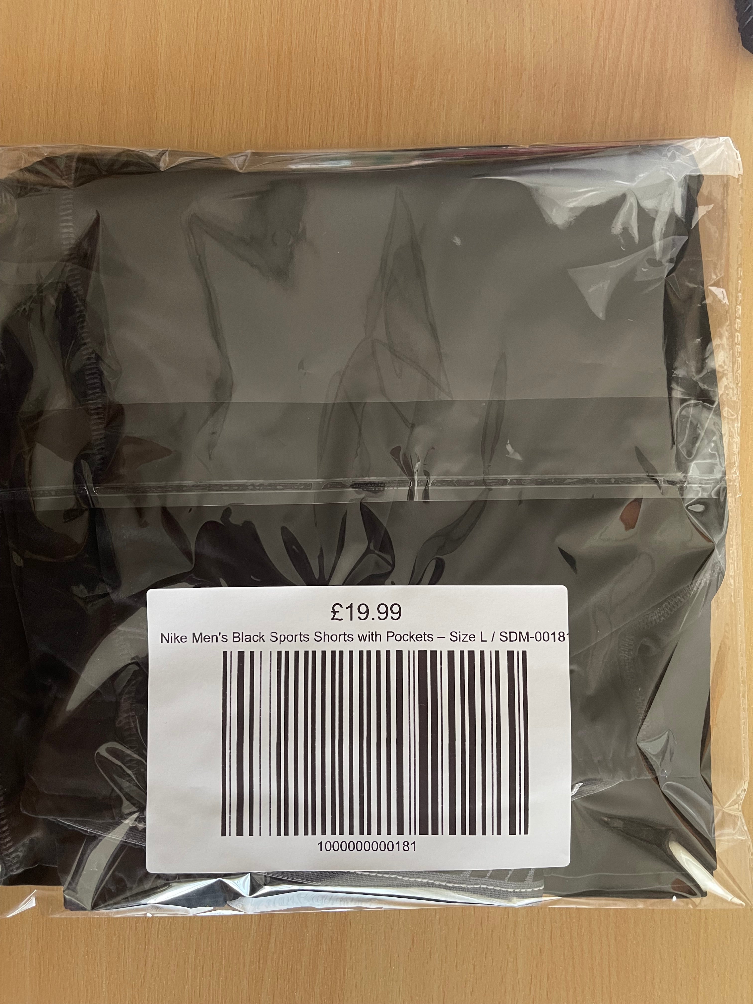 Nike Men's Black Sports Shorts with Pockets – Size L