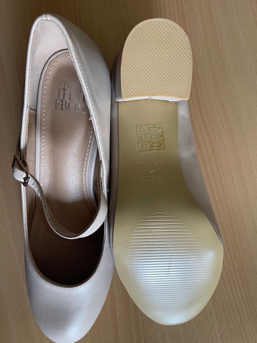 Elegant women’s cream heels with a rounded toe and adjustable ankle strap. 👠