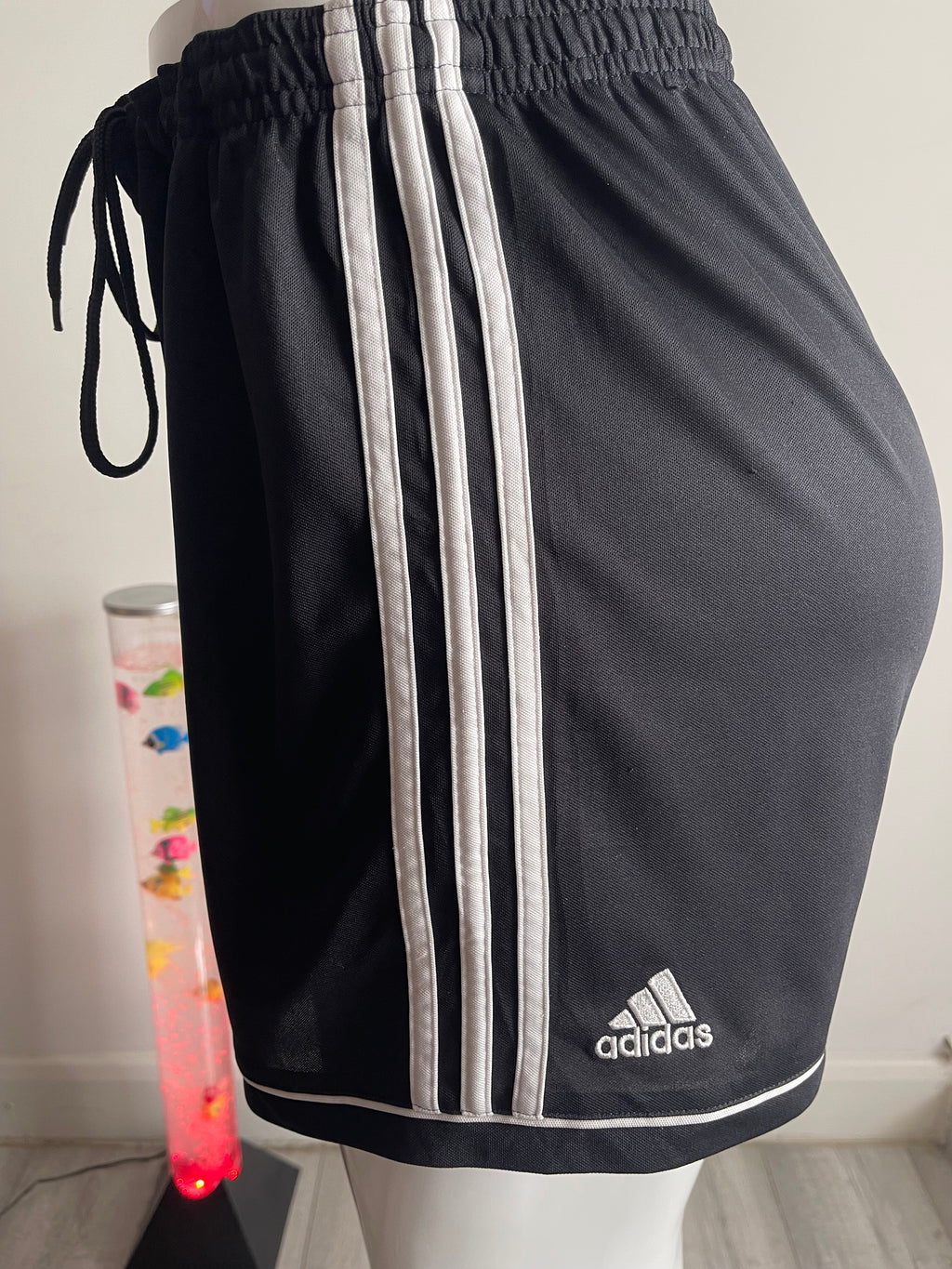 🏃‍♀️ Stylish Adidas women's training shorts in black with white side panel and Adidas logo.