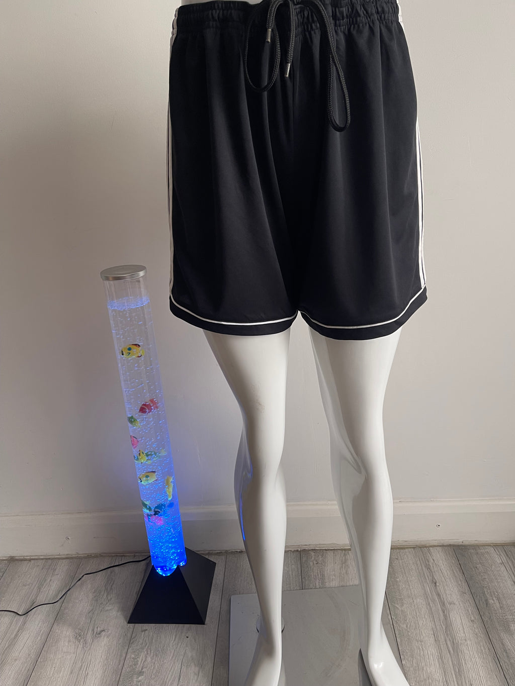 🏃‍♀️ Stylish Adidas women's training shorts in black with white side panel and Adidas logo.